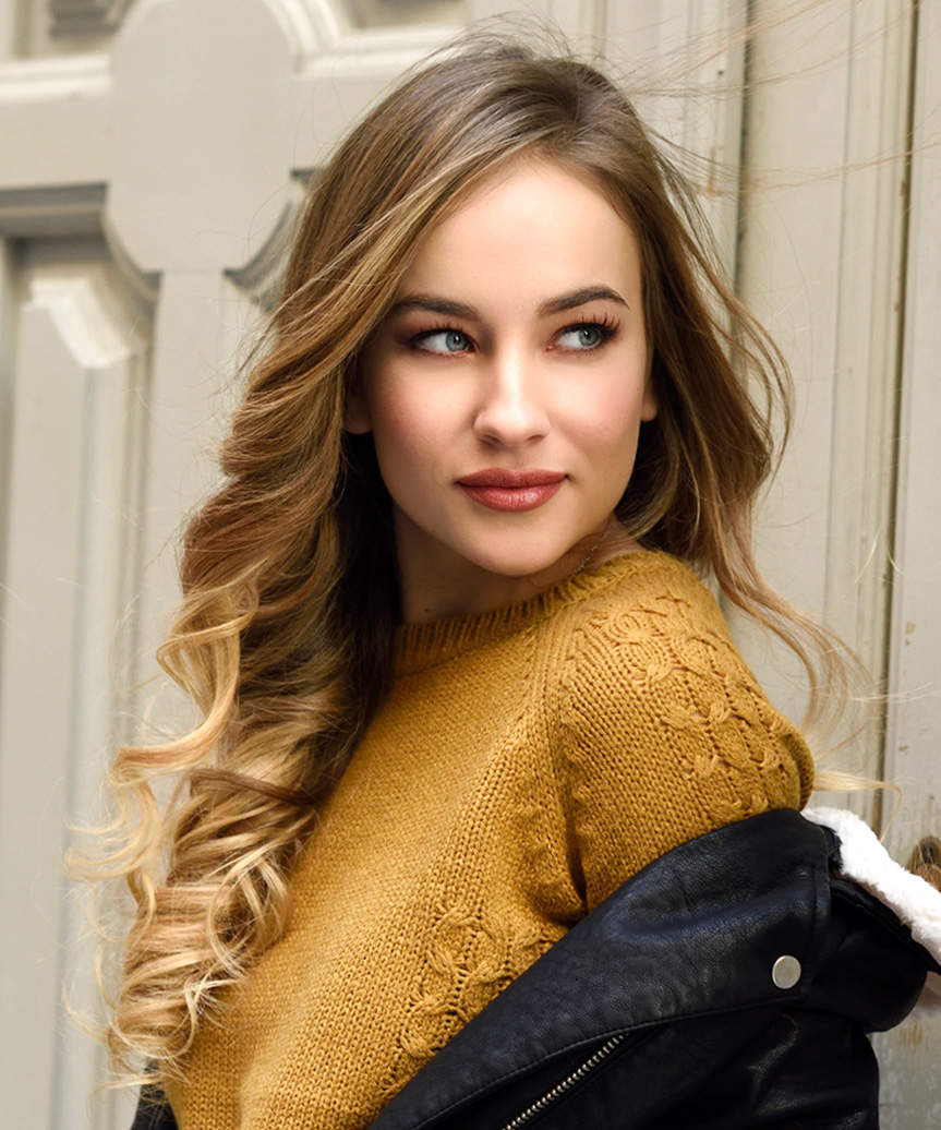 Long Hairstyle With Side-Swept Bangs And Gentle Curls - view from the side