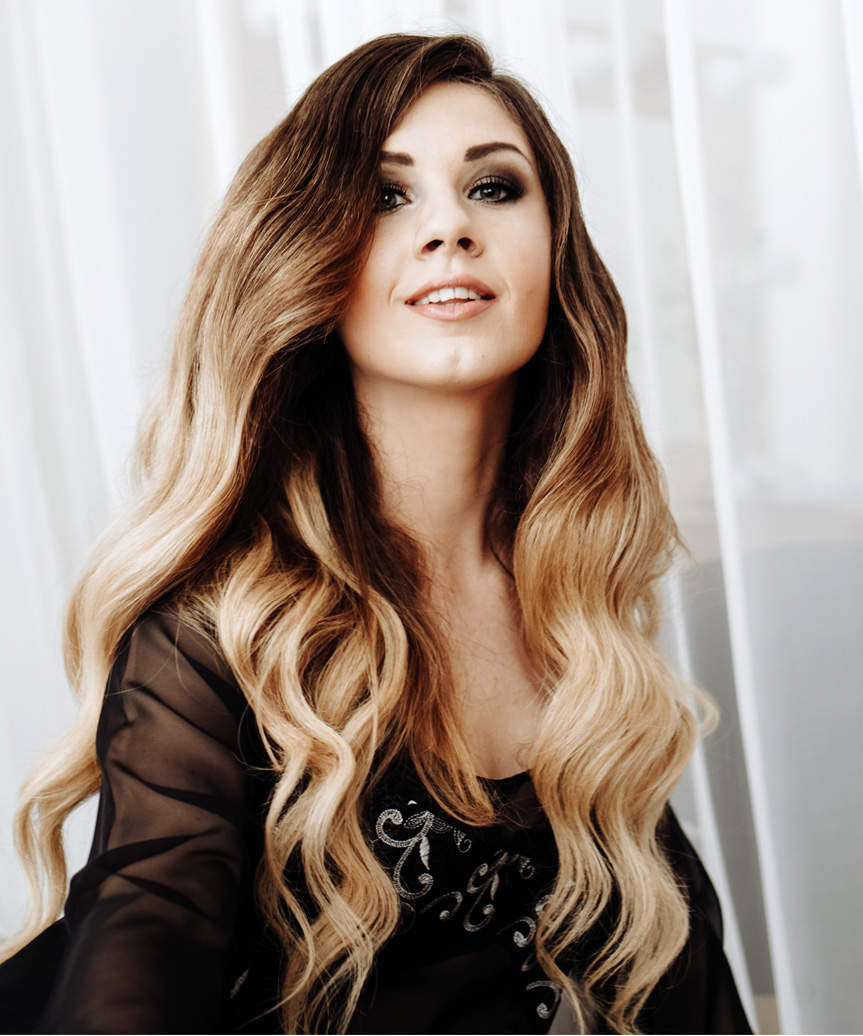 Long Two-Tone Hairstyle With Bold Curls - view from the side