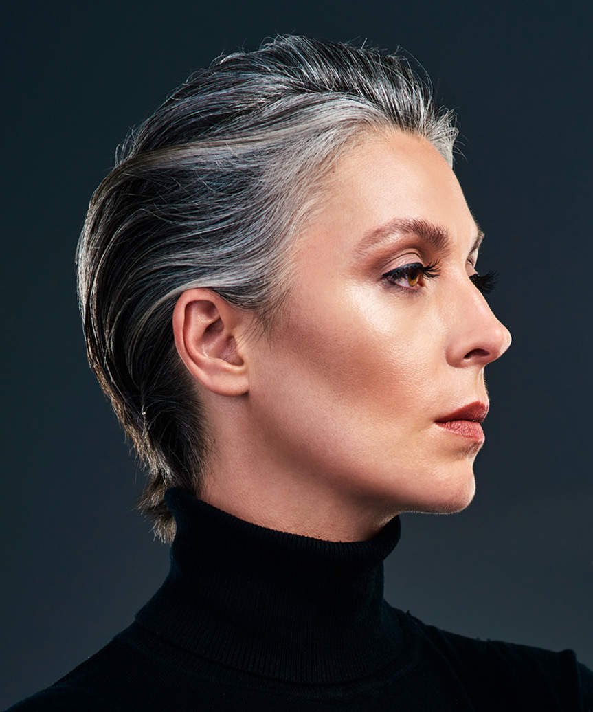 Slicked-Back Pixie Cut With Wet-Look Finish - view from the side