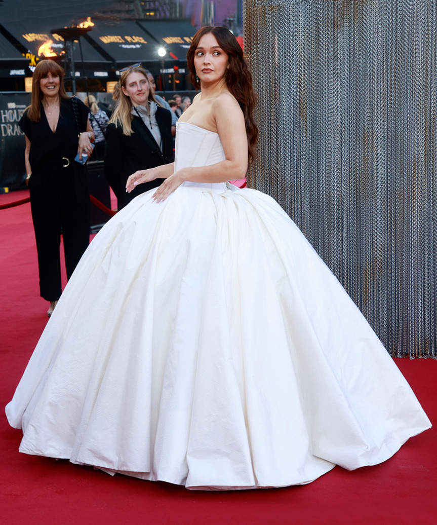 Olivia Cooke Long Hairstyle With Gentle Curls - view from the side