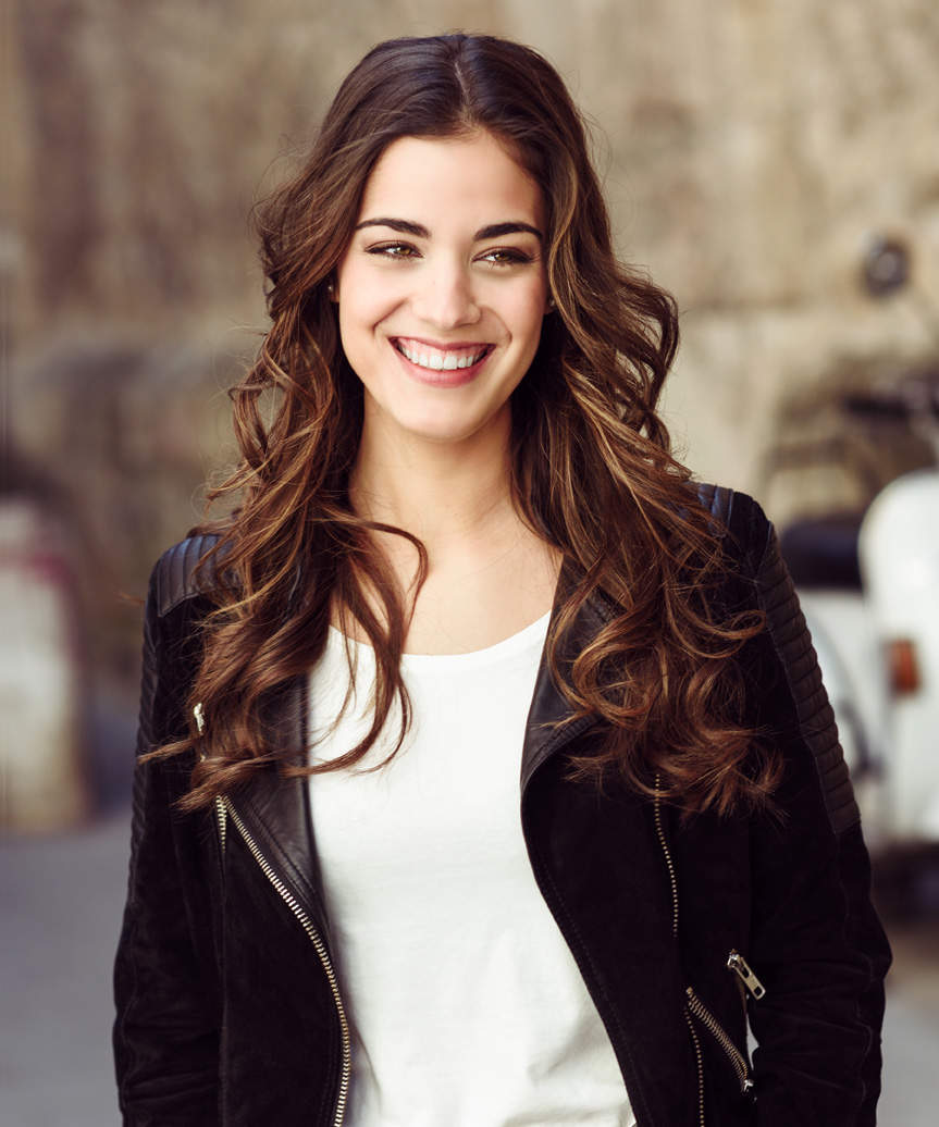 Long Hairstyle With Soft Voluminous Waves And Curls - view from the side