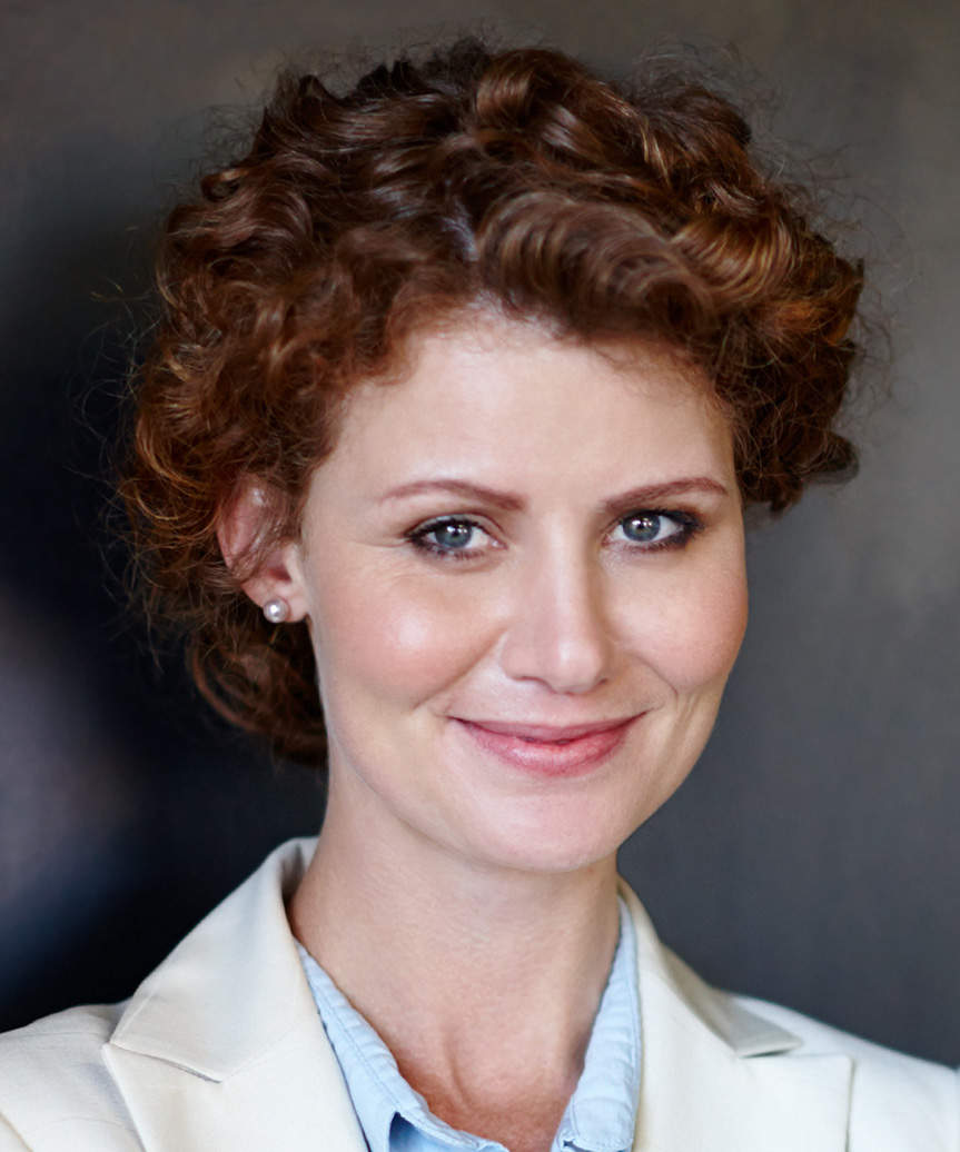 Short Youthful Hairstyle With Curls - view from the side