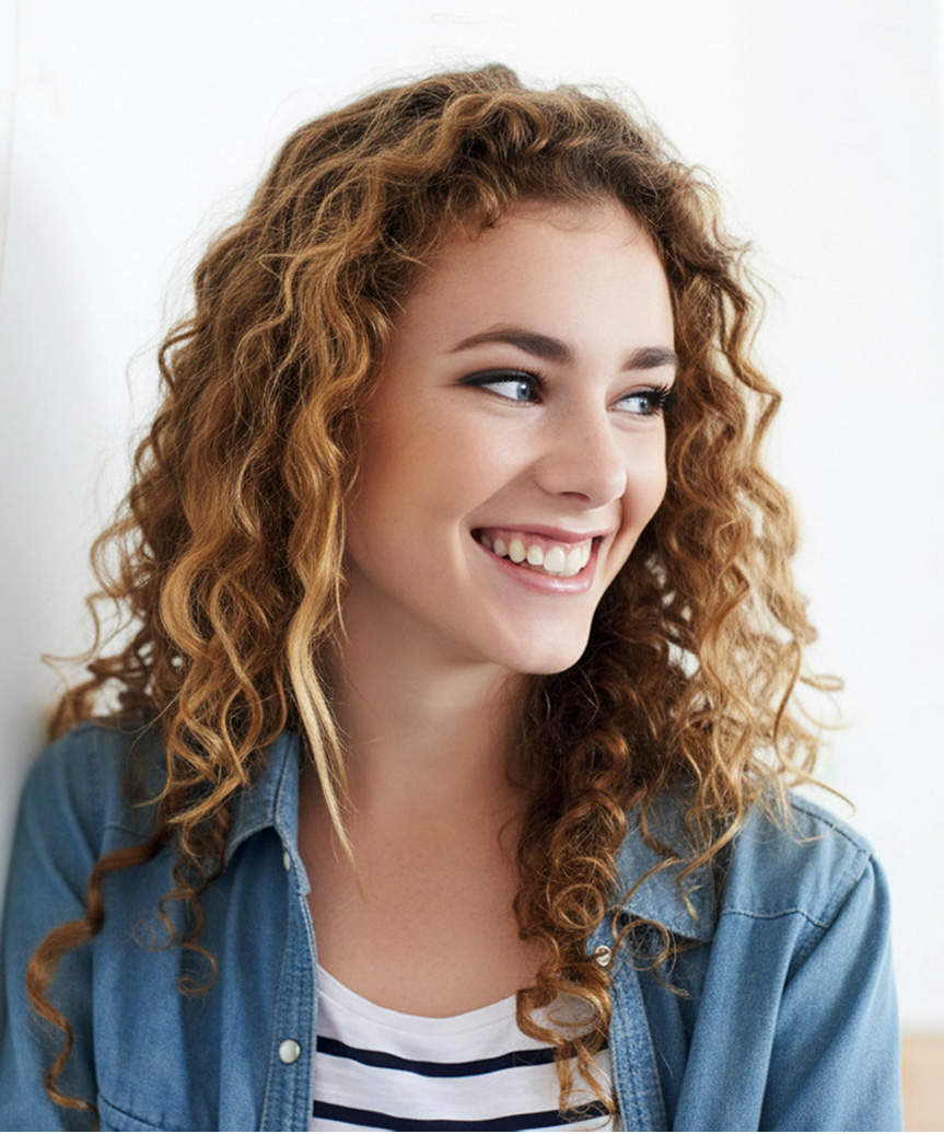 Medium-Length Hairstyle With Natural-Looking Curls - view from the side