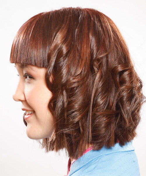  With Contrasting Smooth Bangs And Curls - side on view
