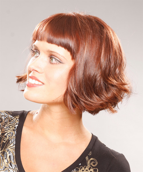 Fun And Flirty Light Red Chin-Length Hairstyle With Waves - side on view