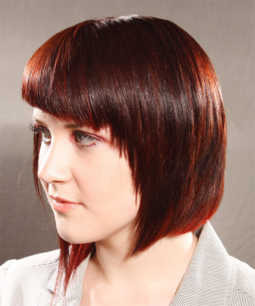 Sleek  Red Hairstyle With Angled Bangs - side on view