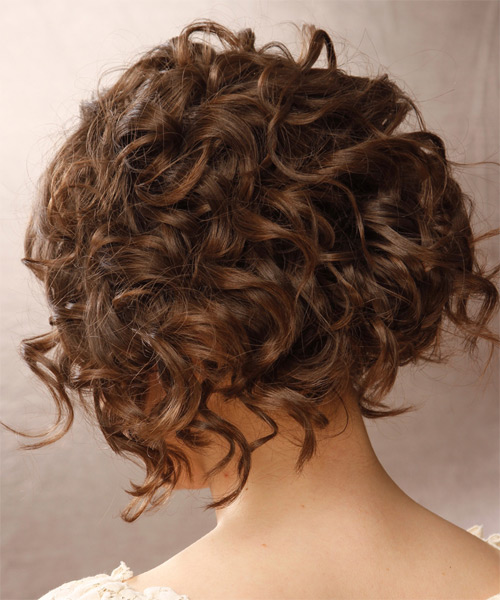 Short Bouncy Brunette Hairstyle With Curls - side on view