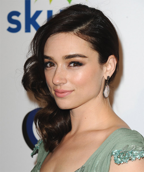 Crystal Reed Medium Wavy side swept hairstyle