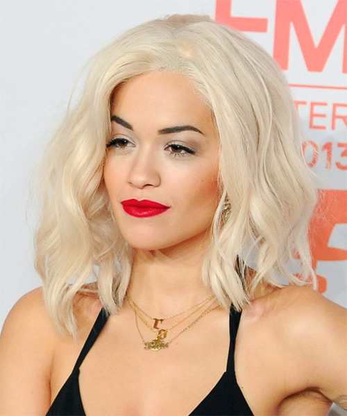 Rita Ora Medium Wavy   Light Platinum Blonde - side on view