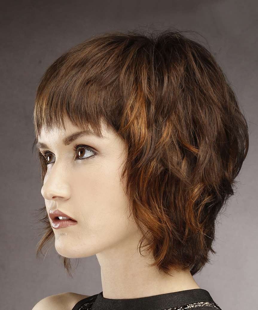 short straight brunette shag hairstyle with layered bangs