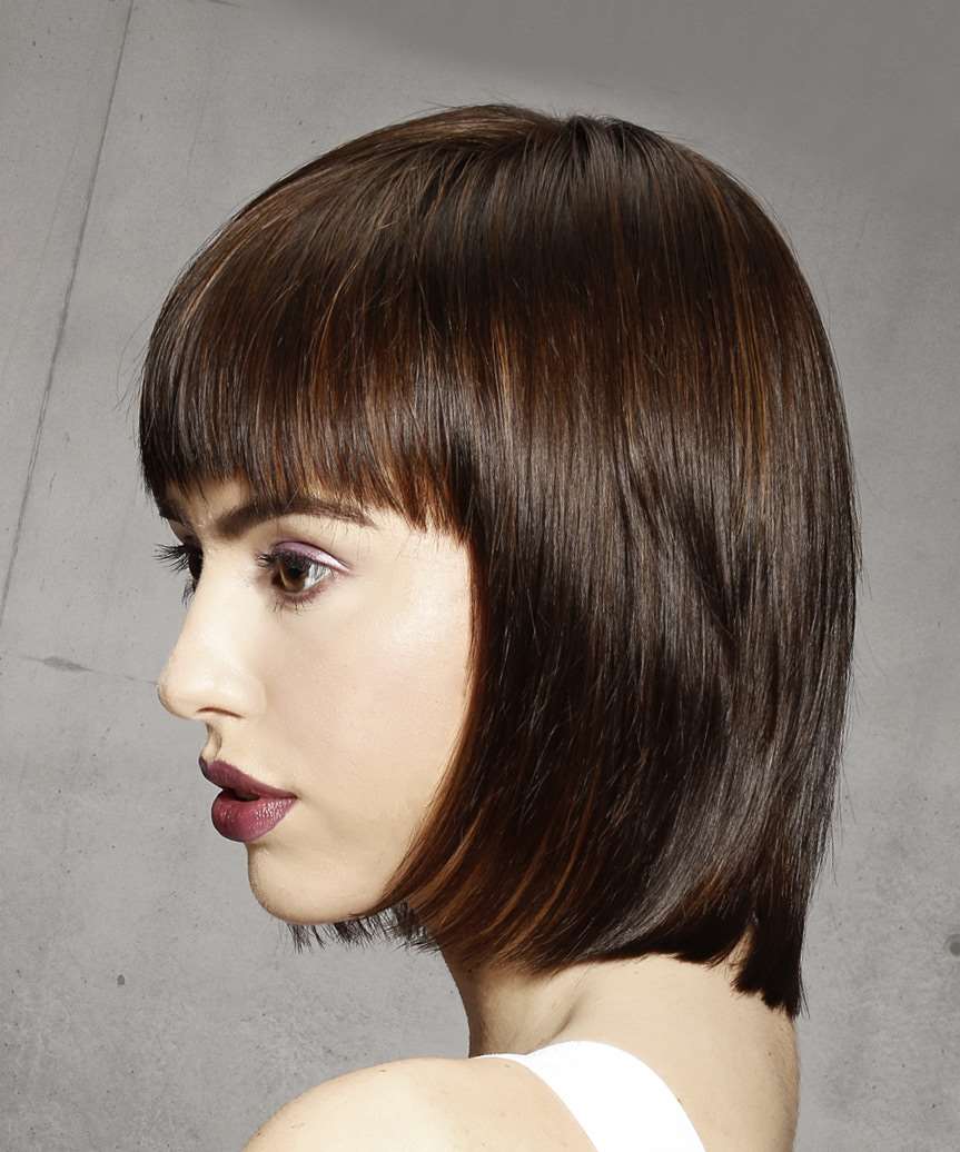 Sleek Pageboy Bob Haircut With Heavy Arched Fringe - side view