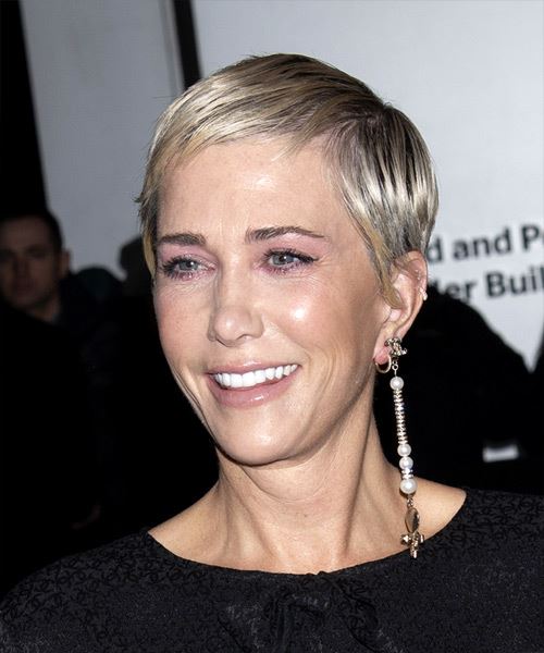 Kristen Wiig      Grey Pixie  Cut with Layered Bangs  and Light Blonde Highlights - Side View