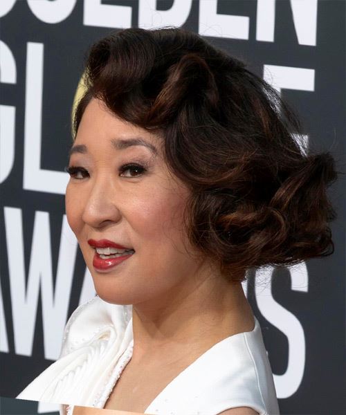Sandra Oh Short Curly   Black  Bob  with Side Swept Bangs  and Dark Brunette Highlights - side view