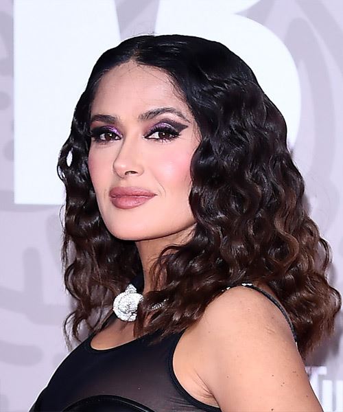 Salma Hayek Shoulder-Length Crimped Hairstyle With Curls - side view