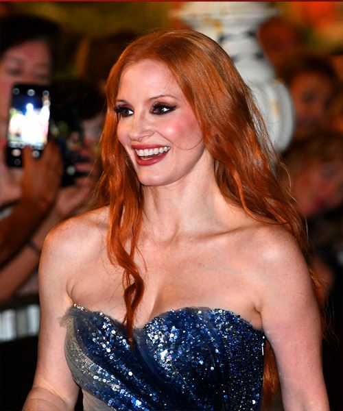 Jessica Chastain Long Firey Hairstyle With Loose Waves - side view