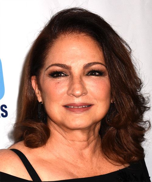 Gloria Estefan Wavy Hairstyle With Volume And Bounce - side view