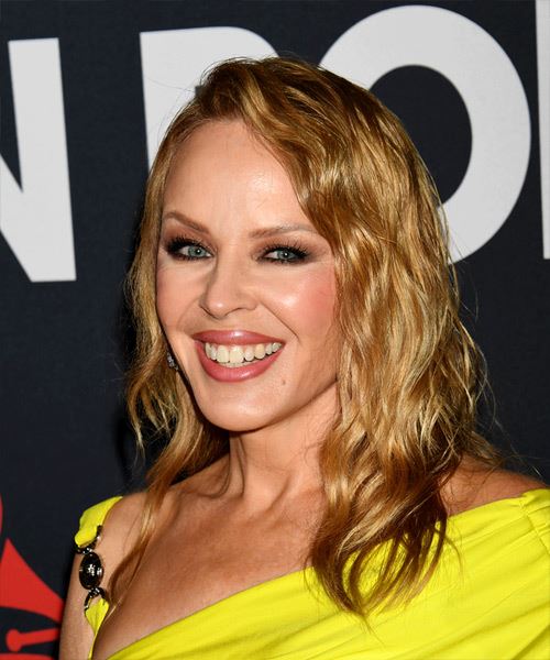 Kylie Minogue Long Wavy    Blonde   with Layered Bangs  and Light Blonde Highlights - side view