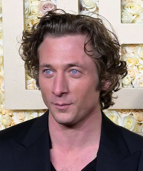 Jeremy Allen White Hairstyle With Curls - side view