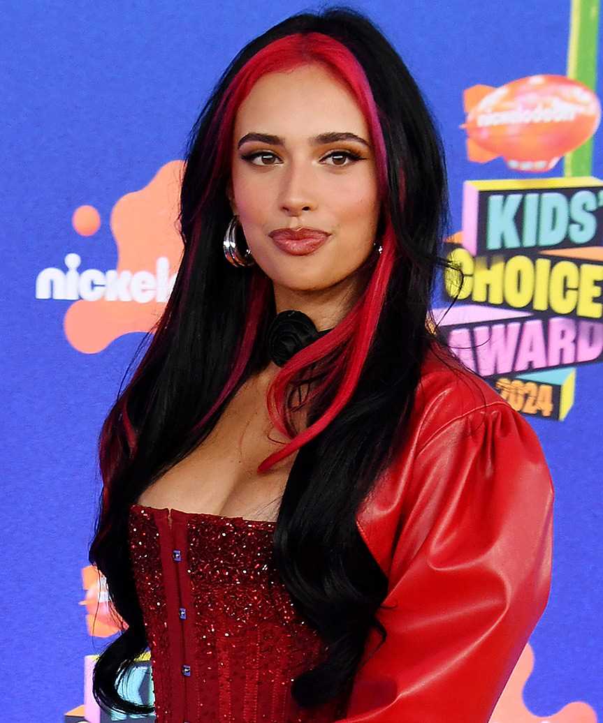 Kylie Cantrall Black Hairstyle With Hot Pink Money Piece - side view