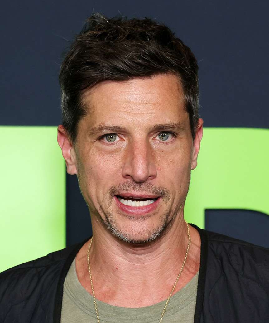 Simon Rex Short Natural Haircut - side view