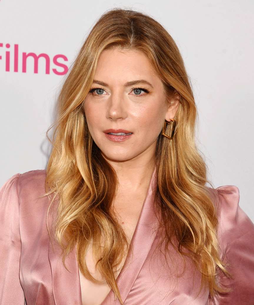 Katheryn Winnick Long Hairstyle With Curls And Subtle Layers - side view
