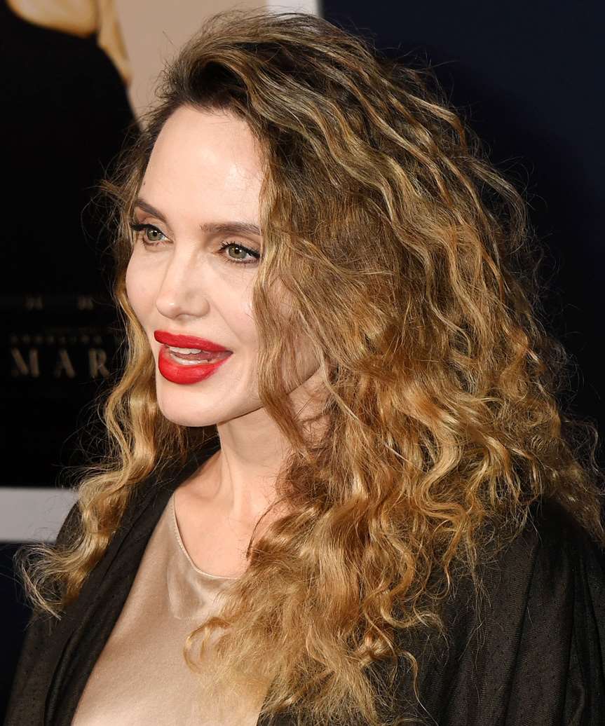 Angelina Jolie Wild Hairstyle With Voluminous Curls - side view