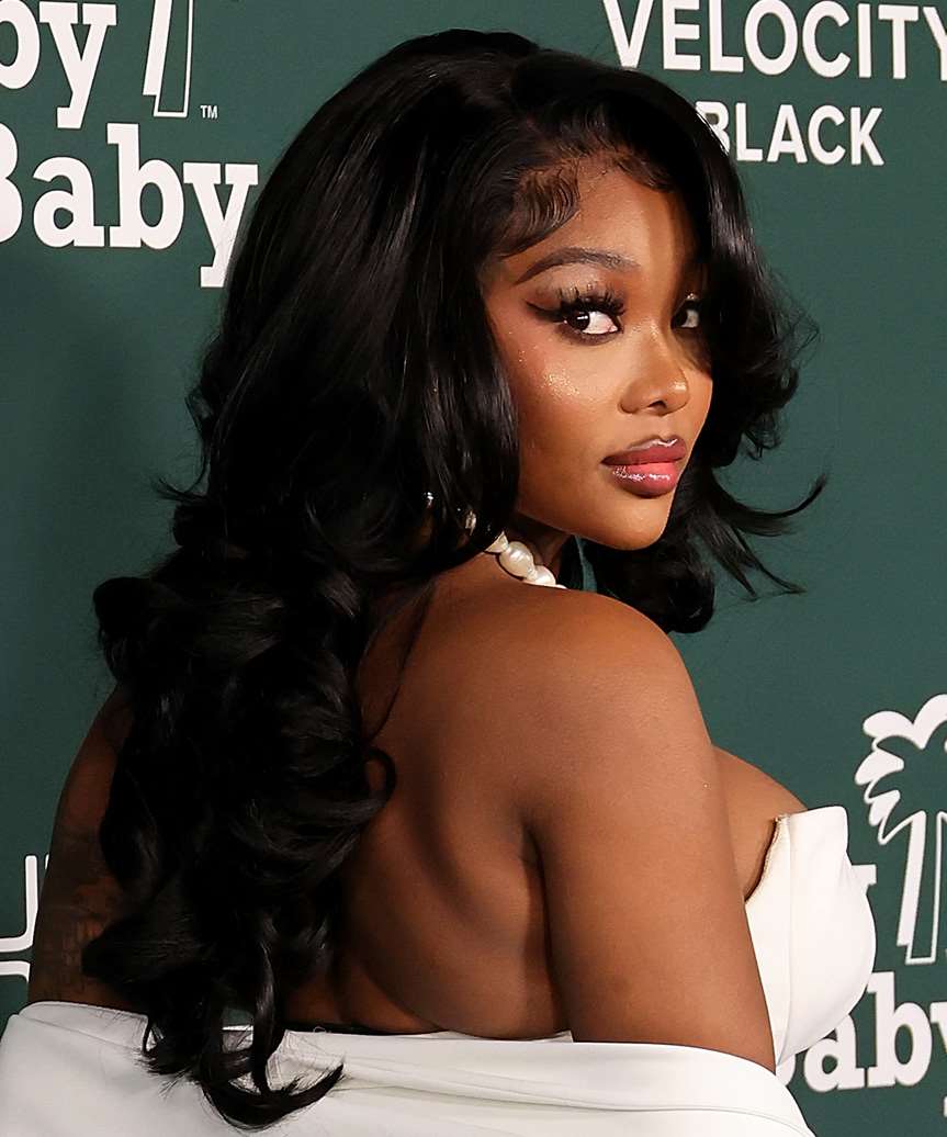 Summer Walker Bold Hairstyle With Curls - side view