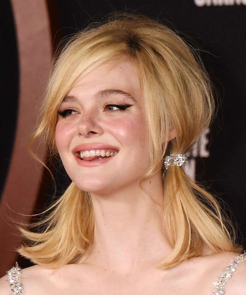 Elle Fanning Youthful Hairstyle With Low Pigtails - side view