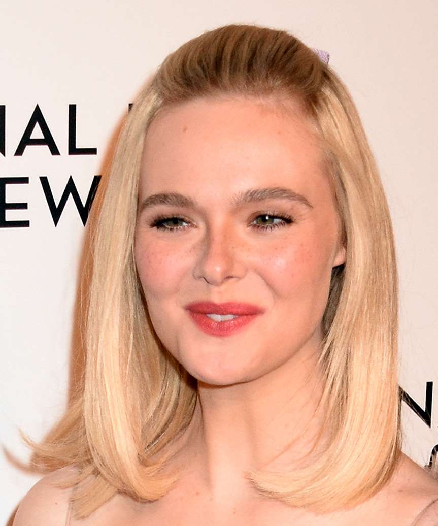 Elle Fanning Classic Hairstyle With Pinned-Back Bangs - side view