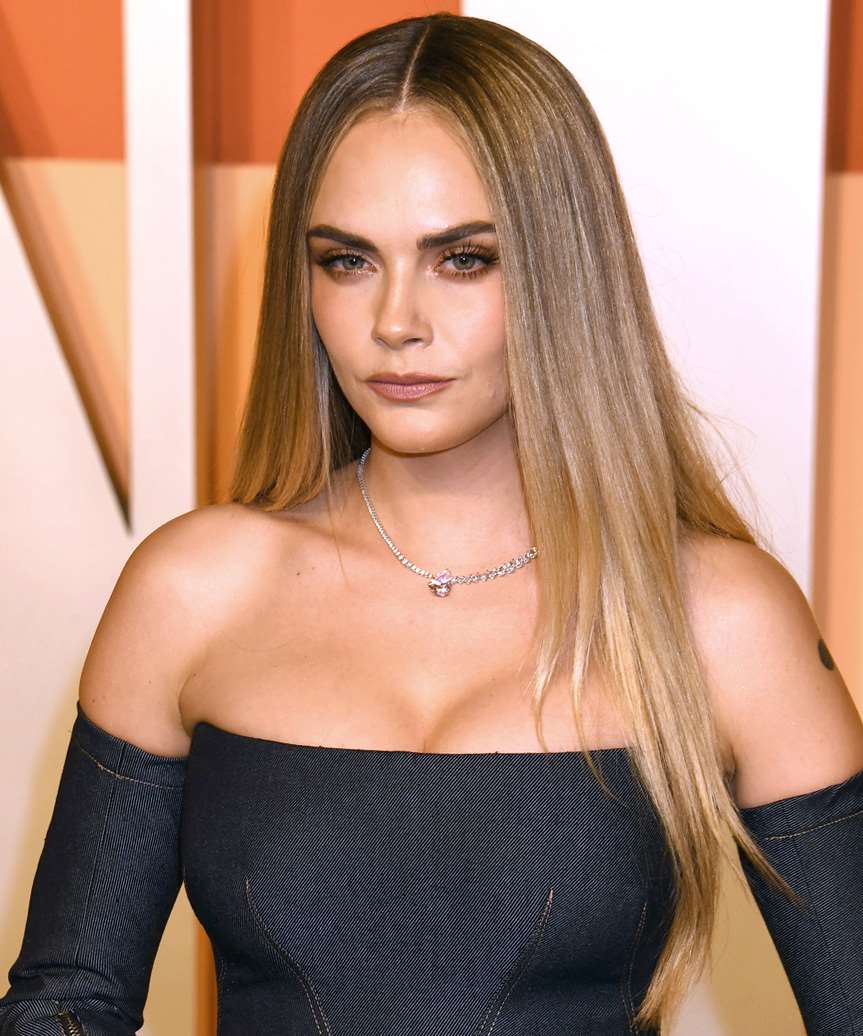 Cara Delevingne Long Sleek Hairstyle - side view