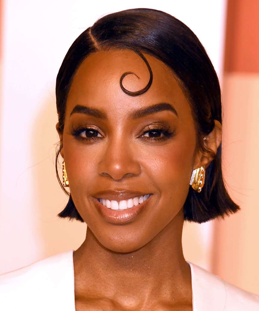 Kelly Rowland Short And Sleek Blunt Bob - side view