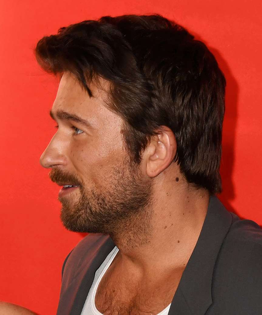 Brandon Sklenar Short Hairstyle With natural Waves - side view