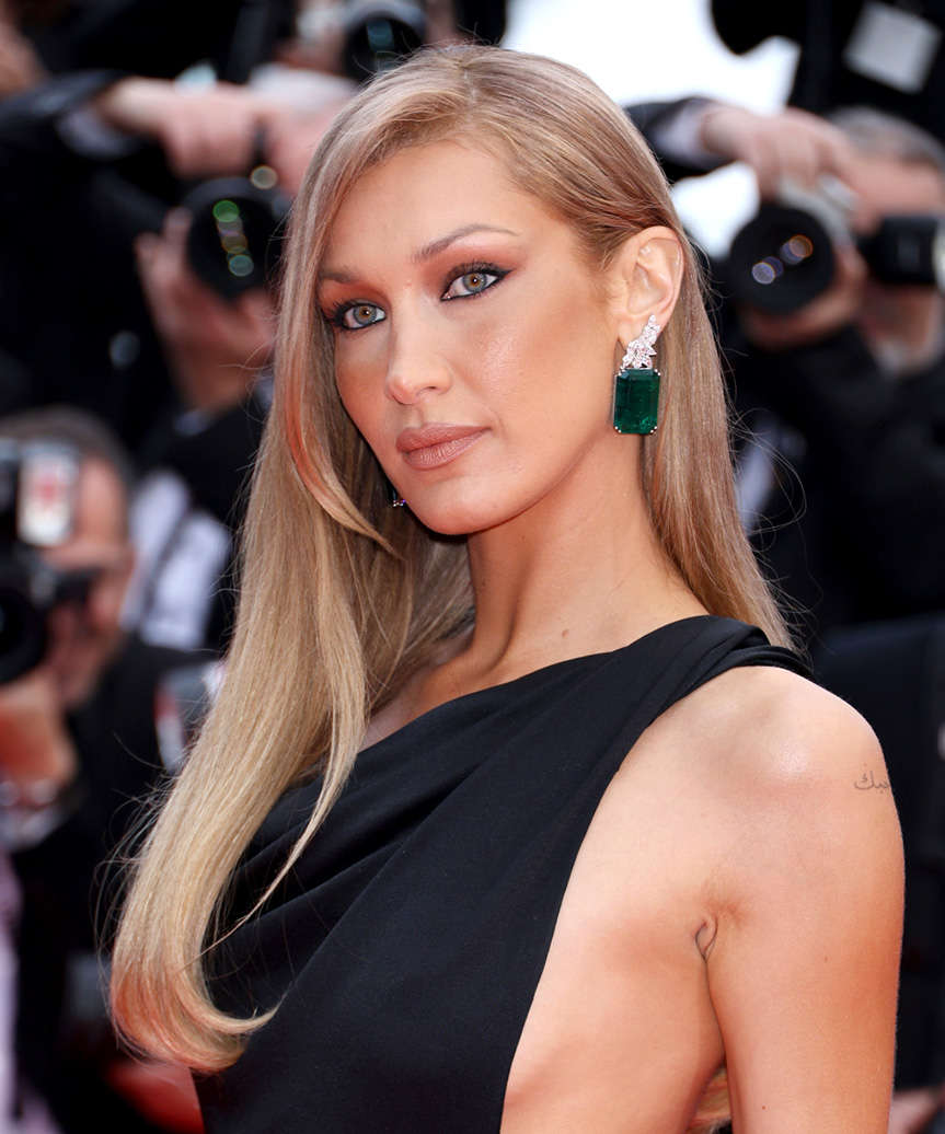 Bella Hadid Long Straight Hairstyle With Side Part - side view