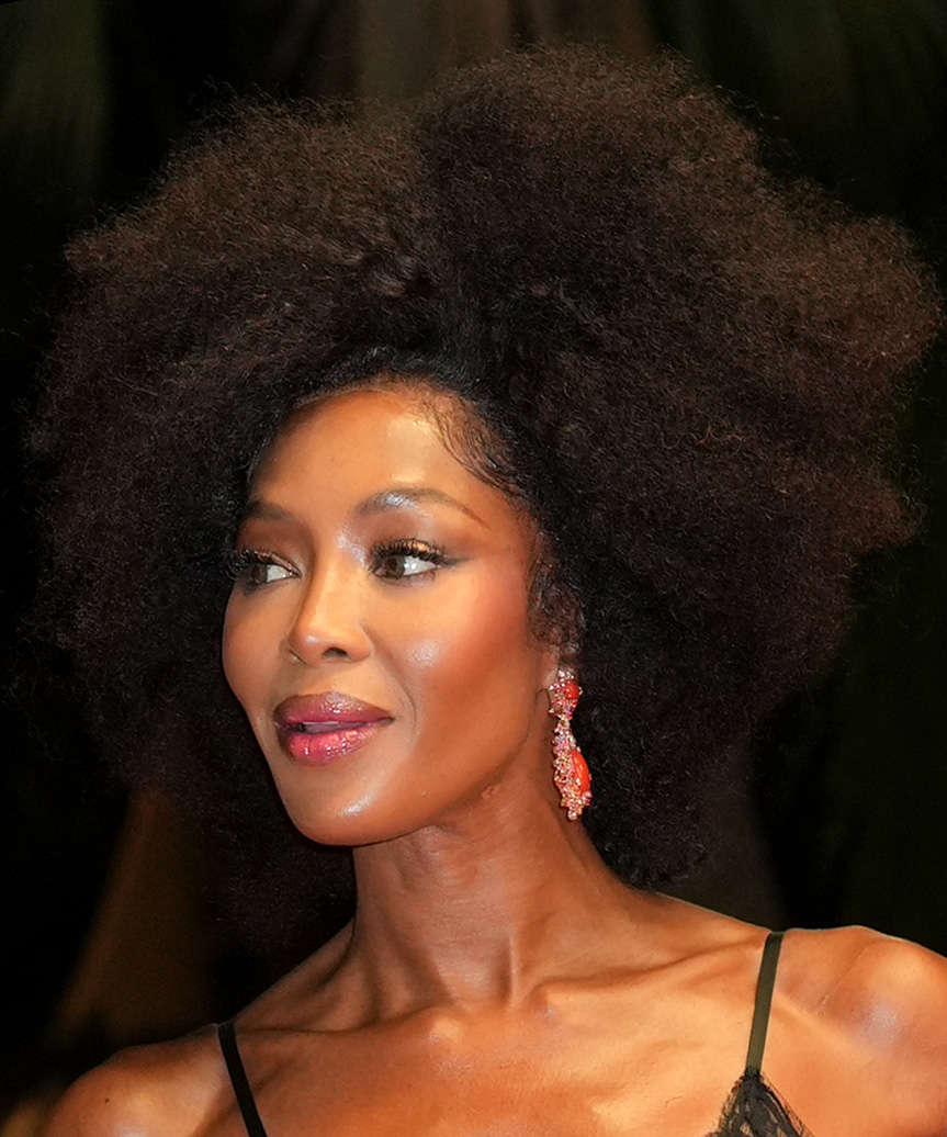Naomi Campbell Bold Afro Hairstyle - side view