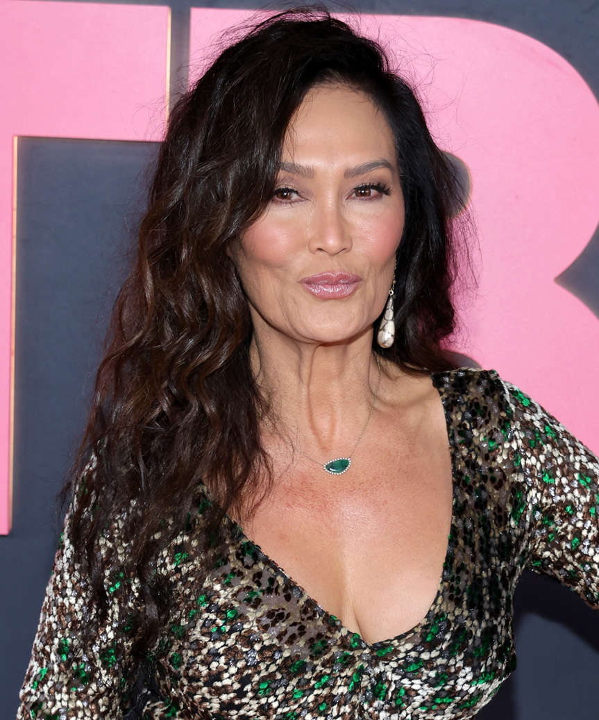Tia Carrere Easy Going Hairstyle With Curls And Side Part - side view