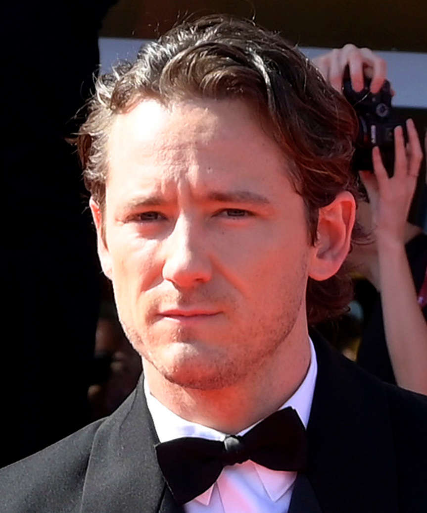 Lewis Pullman Medium-Length Hairstyle With Natural Waves - side view