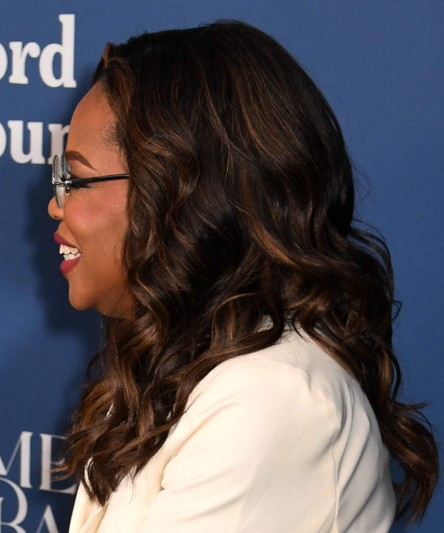 Oprah Winfrey Hairstyle With Bold Curls - side view
