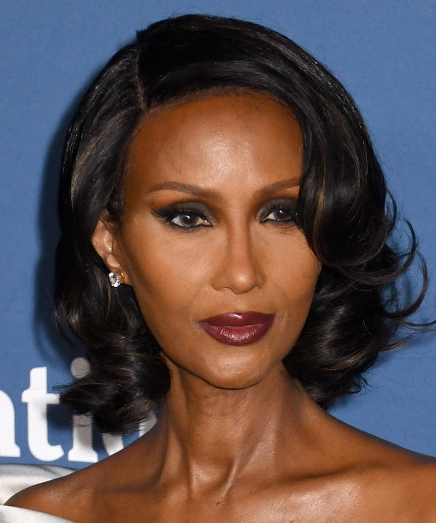 Iman Medium-Length Hairstyle With Mid-End Curls - side view