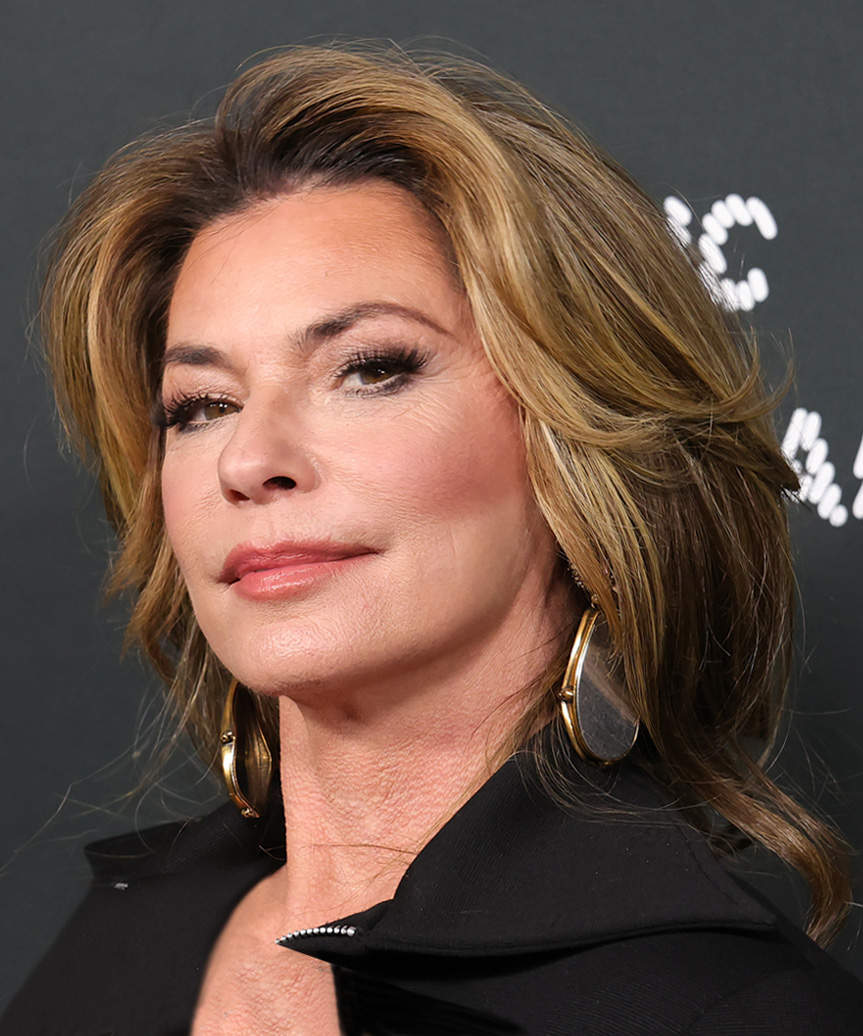 Shania Twain Medium-Length Hairstyle With Subtle Curls - side view