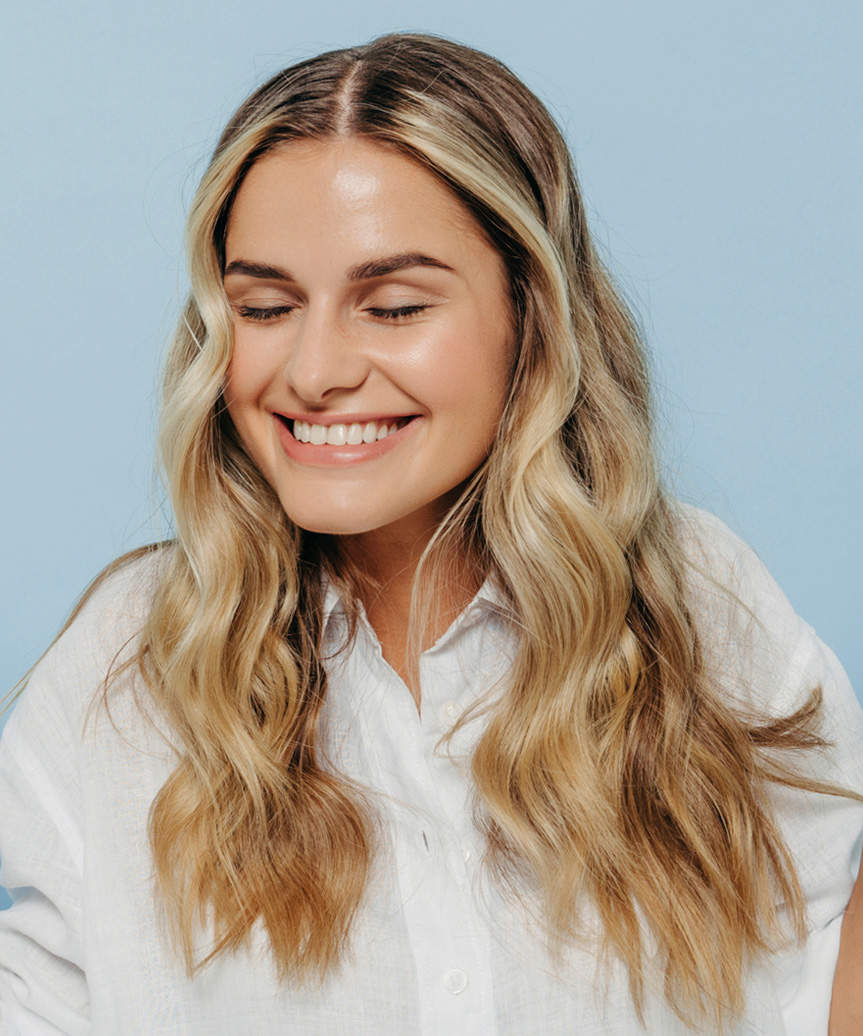 Fun Long Blonde Hairstyle With Curls - side view