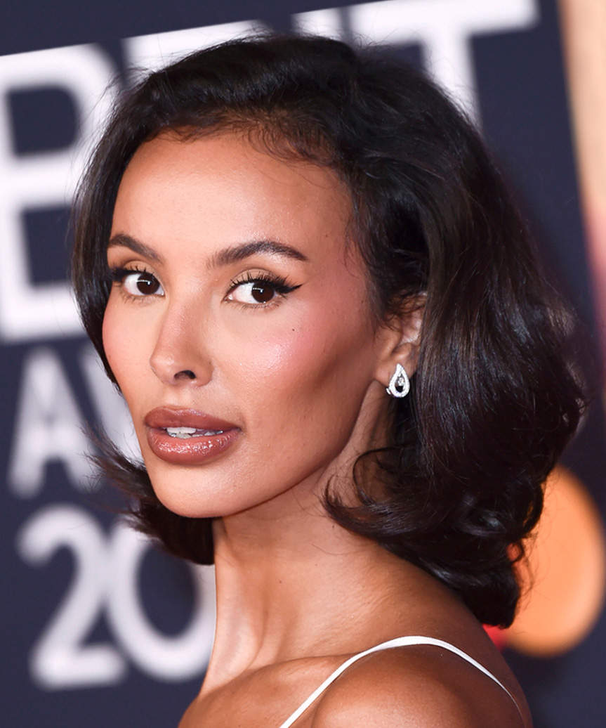 Maya Jama Medium-Length Hairstyle With Gorgeous Curls - side view