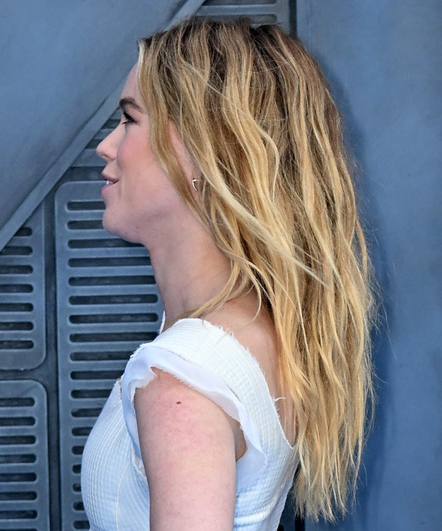Milly Alcock Medium-Length Hairstyle With Beachy Waves - side view