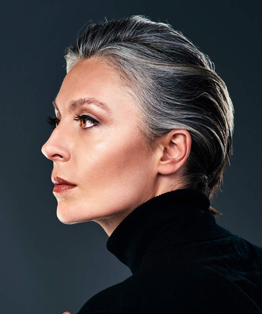 Slicked-Back Pixie Cut With Wet-Look Finish - side view