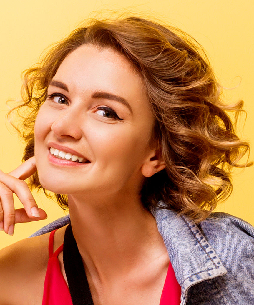 Short Playful Hairstyle With Curls - side view