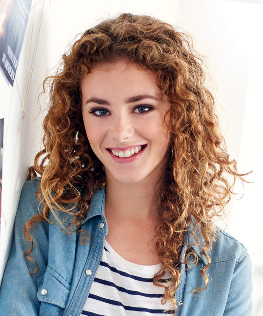 Medium-Length Hairstyle With Natural-Looking Curls - side view