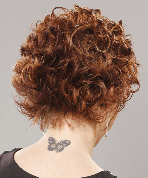 Short Curly Ginger Hairstyle With Layered Bangs