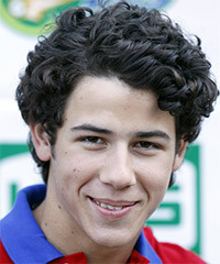 Nick Jonas Short Curly Black Hairstyle