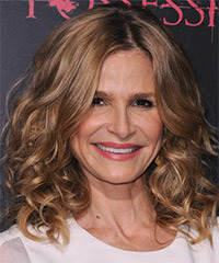 Kyra Sedgwick Medium Curly   Light Caramel Brunette   Hairstyle   with  Blonde Highlights