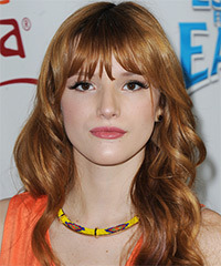 Bella Thorne Long Wavy Ginger Red Hairstyle with Blunt Cut Bangs