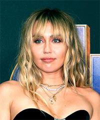 Miley Cyrus Voluminous Hairstyle With Blunt Cut Bangs